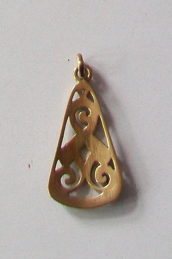 Anhänger der Kelten mit Art einer Triskele Bronze